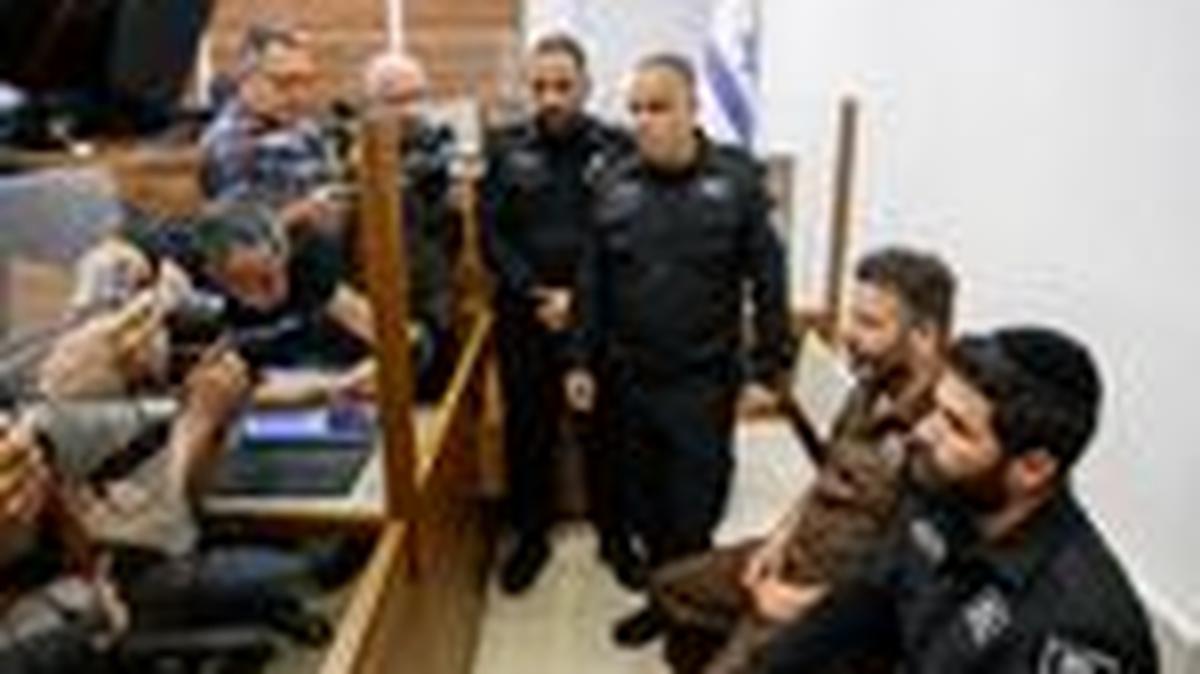 Activist Saif Abu Keshek, a member of the Global Sumud Flotilla detained by Israel, sits at a magistrate's court for a detention extension hearing in Ashkelon, southern Israel, May 3, 2026. REUTERS/Amir Cohen