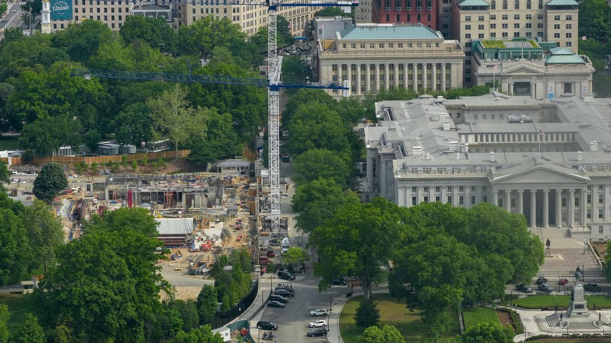 Aerial view from the top of the Washington Monument shows construction crews as they continue site preparation for a planned White House ballroom in the area of the former East Wing in Washington, D.C., U.S., May 2, 2026. REUTERS/Ken Cedeno