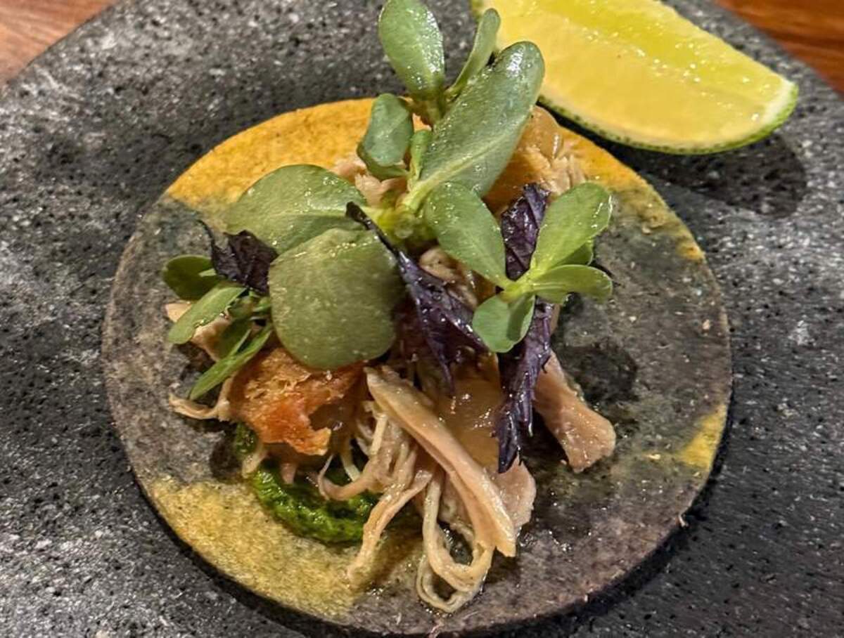  The stunning pork tostada at Xal, designed to challenge expectations and spark deep dinner table conversations. Photo credit: Cristine Struble 