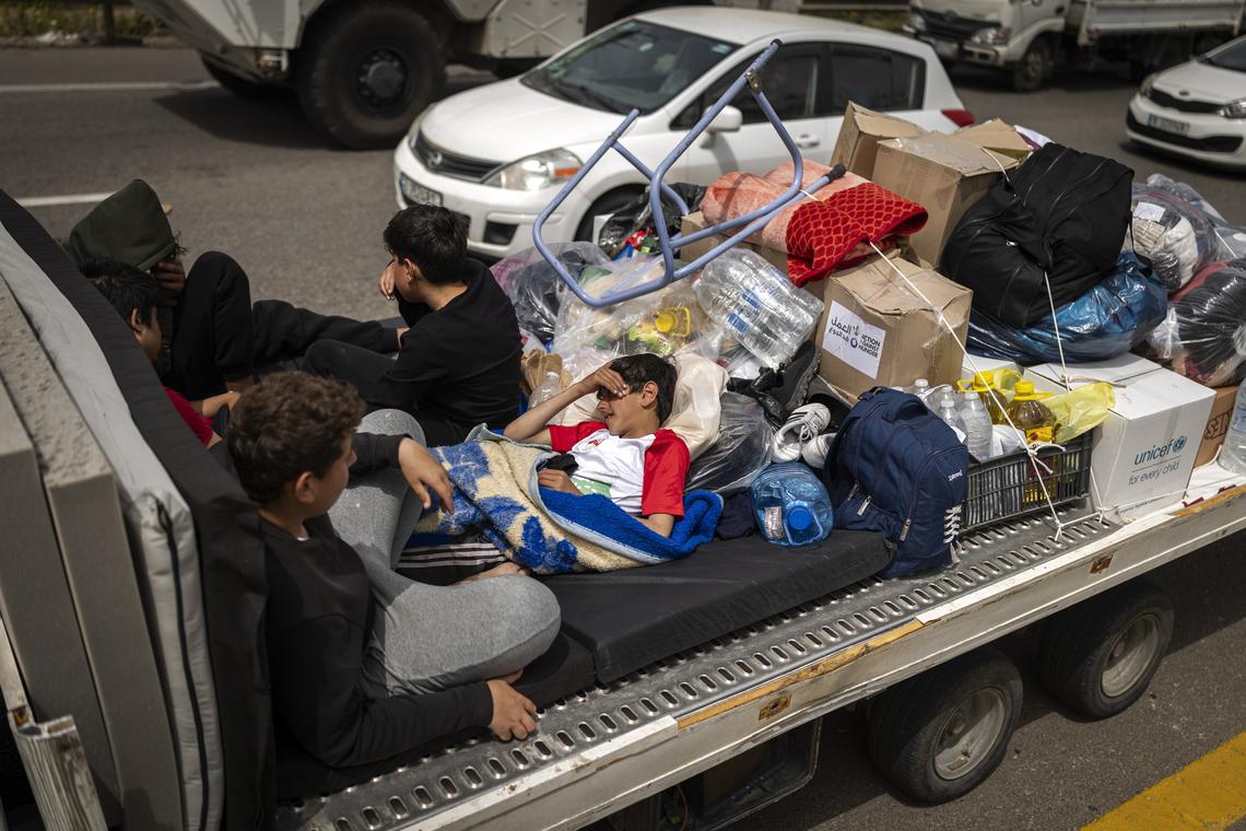A Lebanese family returning south on the Beirut to Sidon coastal highway, on the second day of the ceasefire, Saturday, April 18, 2026. Prime Minister Benjamin Netanyahu said Israeli troops would remain inside Lebanon, as part of what he called an "expanded security zone" from Lebanon's Mediterranean coast to its border with Syria, south of the Litani River. (Diego Ibarra Sánchez/The New York Times)