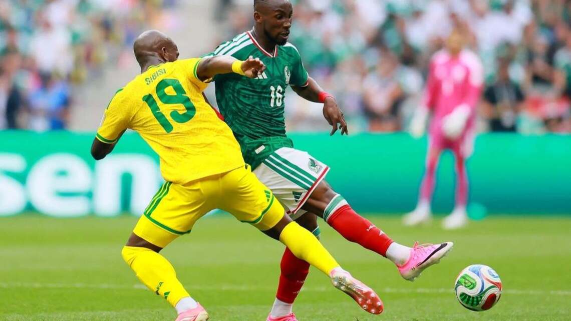 Mexico kick off World Cup with 2-0 win over 9-man South Africa 