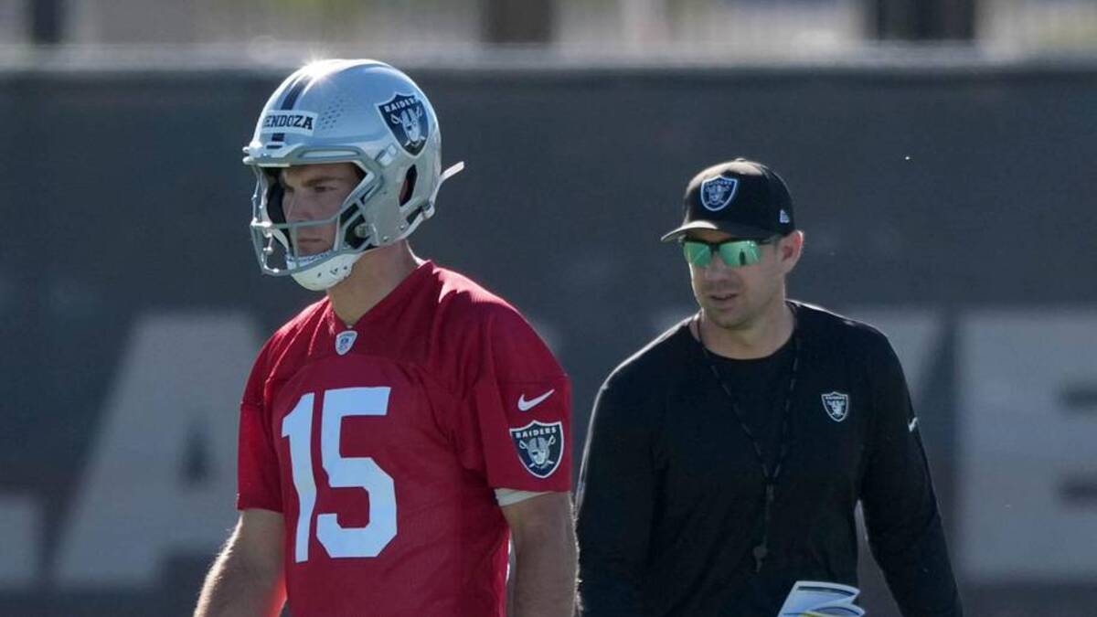  Jun 9, 2026; Henderson, NV, USA; Las Vegas Raiders quarterback Fernando Mendoza (15) and coach Klint Kubiak during minicamp at Intermountain Health Performance Center. Mandatory Credit: Kirby Lee-Imagn Images | Kirby Lee-Imagn Images 