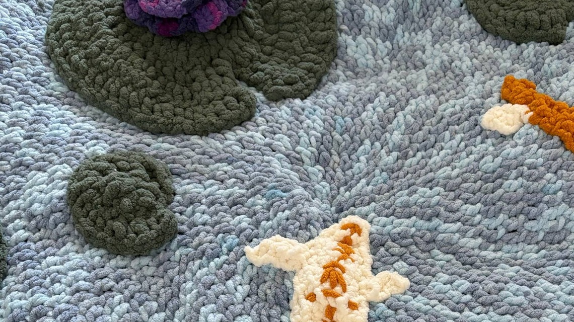Fiber Artist Crocheted the Most Whimsical Koi Pond Cushion and It Now Has the Perfect Home 
