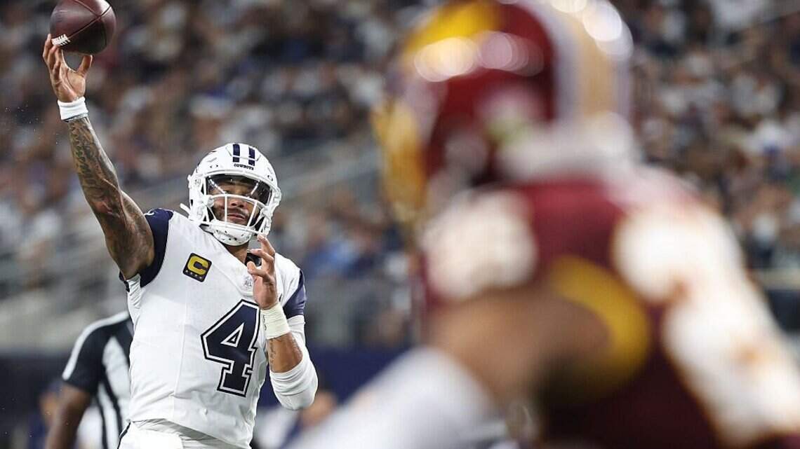 Cowboys stomp Commanders 37-20 as Dak Prescott sets team TD mark