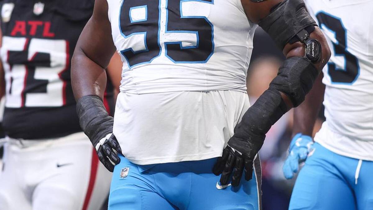  Carolina Panthers defensive tackle Derrick Brown (95) looks on in between plays in the first half against the Atlanta Falcons. | Brett Davis-Imagn Images 