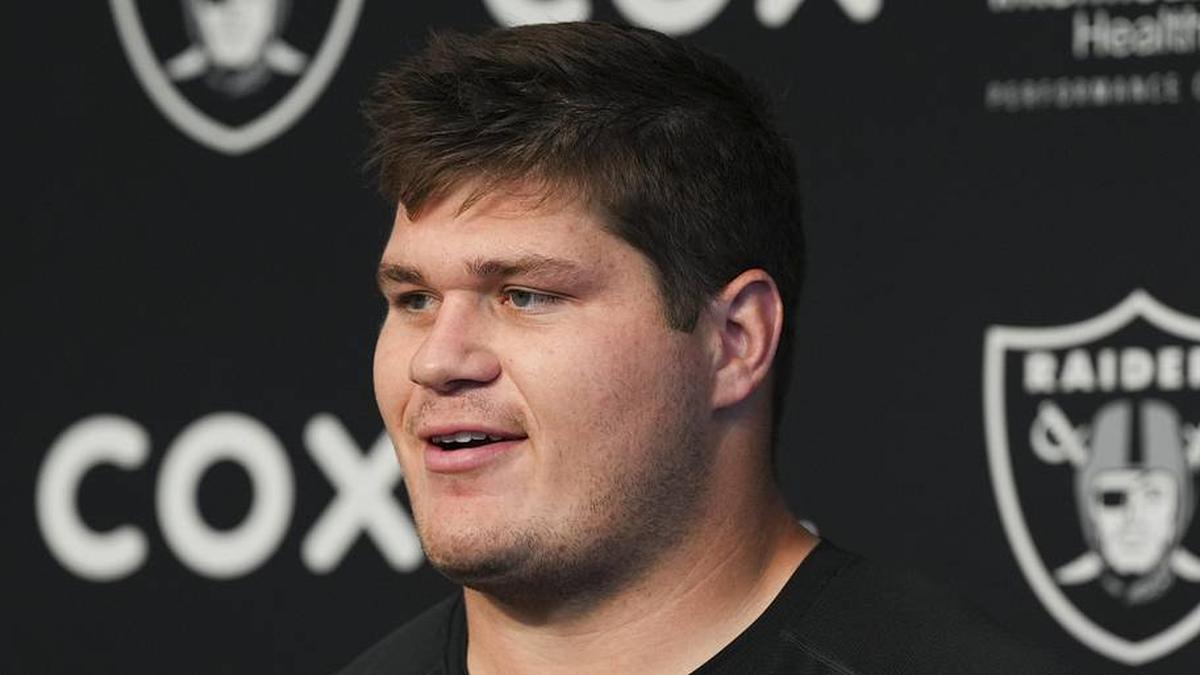  May 28, 2026; Henderson, NV, USA; Las Vegas Raiders center Tyler Linderbaum (65) speaks during a news conference during organized team activities at Intermountain Health Performance Center. Mandatory Credit: Candice Ward-Imagn Images | Candice Ward-Imagn Images 