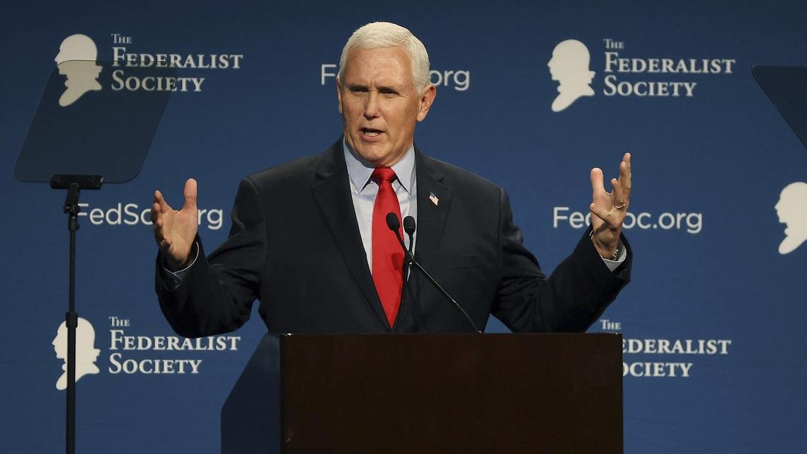 Former Vice President Mike Pence speaks at the Florida chapter of the Federalist Society’s annual meeting at Disney’s Yacht Club resort in Walt Disney World on Friday in Orlando. He directly rebutted Donald Trump’s false claims that Pence somehow could have overturned the results of the 2020 election.