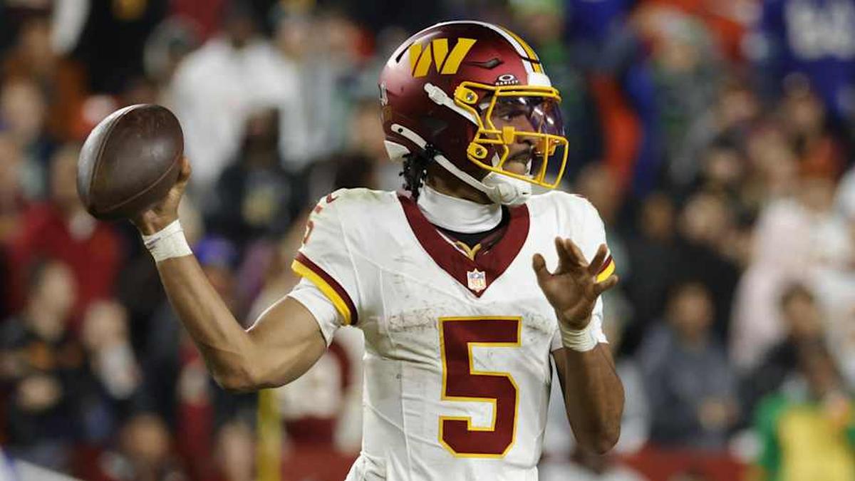  Nov 2, 2025; Landover, Maryland, USA; Washington Commanders quarterback Jayden Daniels (5) passes the ball during the second half against the Seattle Seahawks at Northwest Stadium. Mandatory Credit: Amber Searls-Imagn Images | Amber Searls-Imagn Images 
