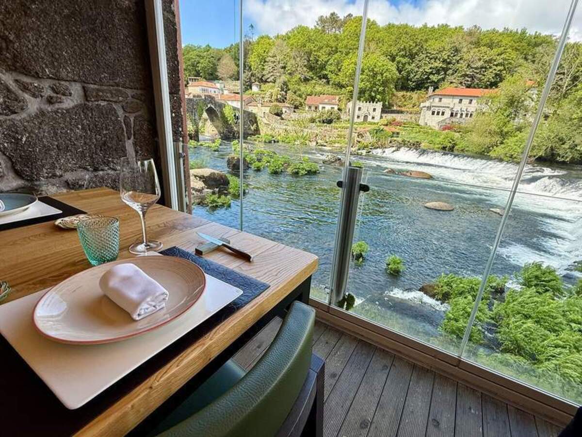  Lunch and a view at the Restaurante Ponte Maceira. Photo credit: Margot Black 
