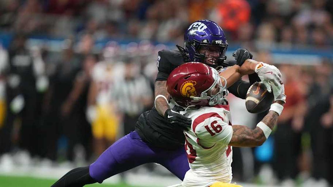  Dec 30, 2025; San Antonio, TX, USA; Southern California Trojans wide receiver Tanook Hines (16) catches the ball against TCU Horned Frogs cornerback Vernon Glover (26) in the second half during the Alamo Bowl at Alamodome. Mandatory Credit: Kirby Lee-Imagn Images | Kirby Lee-Imagn Images 