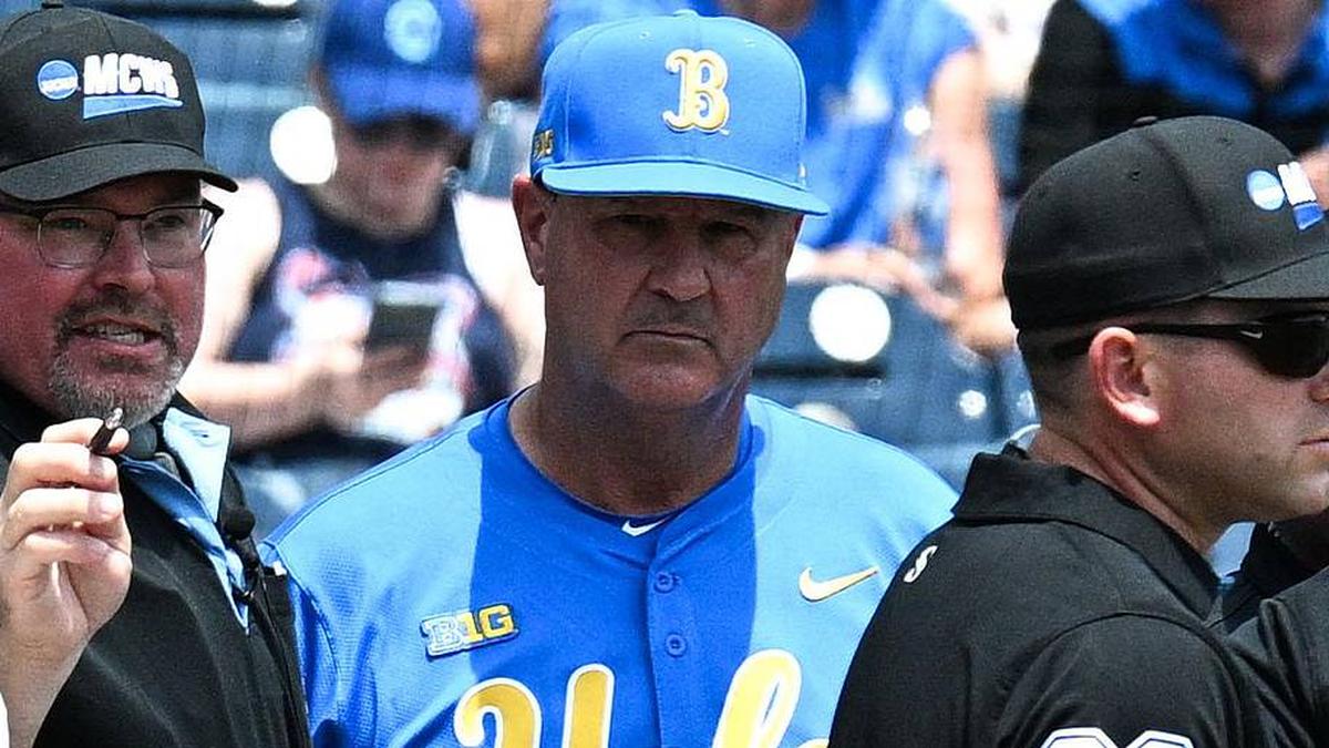  Jun 14, 2025; Omaha, Neb, USA; Murray State Racers head coach Dan Skirka and UCLA Bruins head coach John Savage meet with umpires before the game at Charles Schwab Field. Mandatory Credit: Steven Branscombe-Imagn Images | Steven Branscombe-Imagn Images 