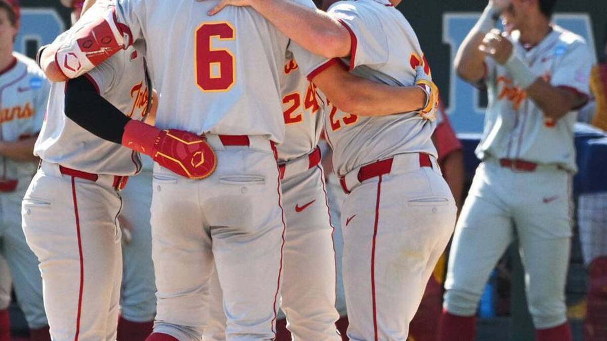  Jun 5, 2026; Chapel Hill, NC, USA; The USC Trojans celebrate a grand slam by USC infielder Dean Carpentier (6) against the North Carolina Tar Heels in the sixth inning at Boshamer Stadium. Mandatory Credit: Zachary Taft-Imagn Images | Zachary Taft-Imagn Images 