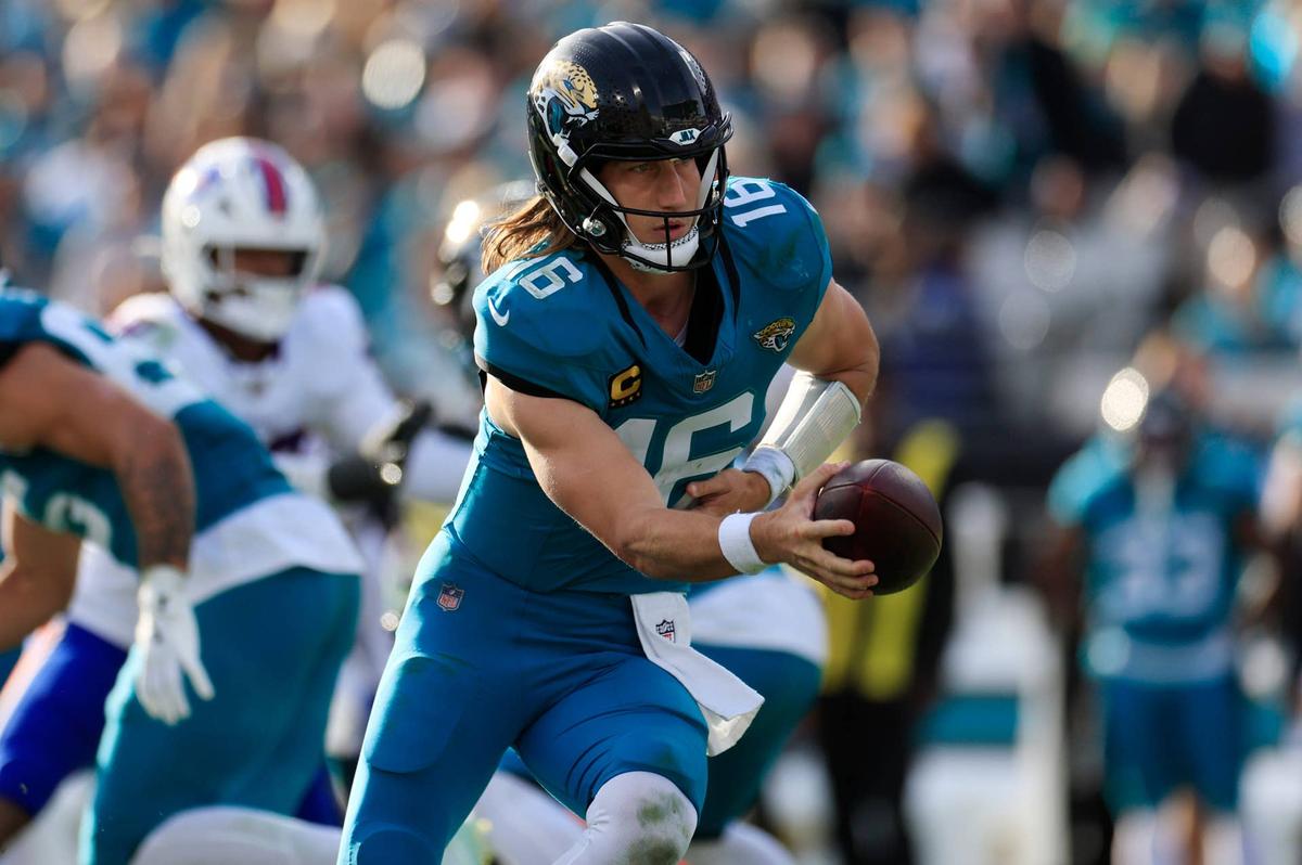  Jacksonville Jaguars quarterback Trevor Lawrence looks to hand off during an AFC Wild Card playoff matchup against the Buffalo Bills. Corey Perrine/Florida Times-Union via Imagn Images