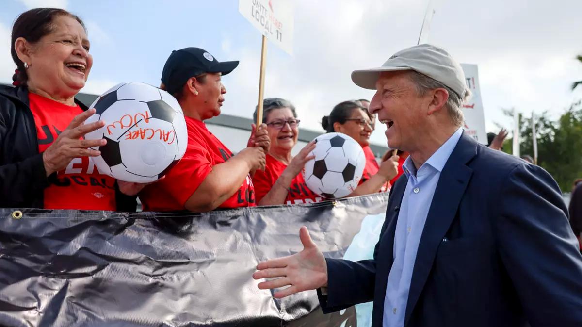 Gubernatorial candidate Tom Steyer greets workers during a Unite Here Local 11 rally for an investigation into FIFA security policies ahead of the 2026 World Cup at SoFi Stadium in Inglewood. (Ronaldo Bolanos/Los Angeles Times/TNS)