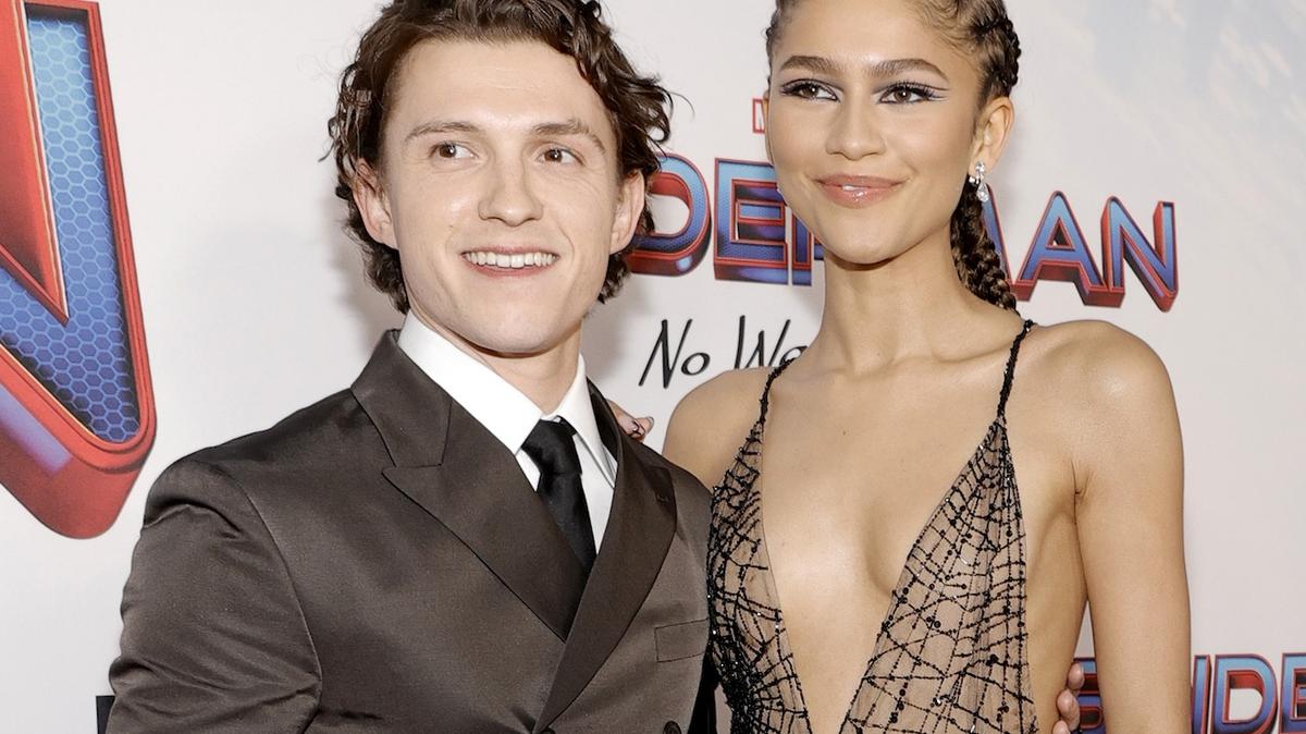 LOS ANGELES, CALIFORNIA - DECEMBER 13: (L-R) Tom Holland and Zendaya attend Sony Pictures' "Spider-Man: No Way Home" Los Angeles Premiere on December 13, 2021 in Los Angeles, California. (Photo by Amy Sussman/Getty Images)