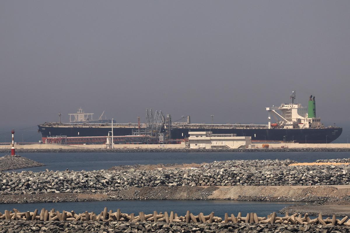 A cargo ship docked at the Port of Fujairah, as the U.S.-Israel conflict with Iran limits marine traffic in the Strait of Hormuz, in Fujairah, United Arab Emirates, May 6, 2026. REUTERS/Amr Alfiky