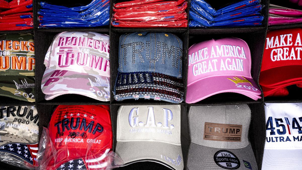 Trump hats and merchandise available for purchase before a rally for Republican presidential candidate former President Donald Trump on May 1, 2024 at Avflight Saginaw in Freeland, Mich. (Nic Antaya/Getty Images/TNS)