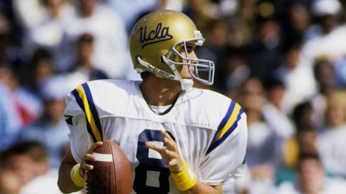  Sep 22, 1990; Ann Arbor, MI, USA; FILE PHOTO; UCLA Bruins quarterback Tommy Maddox (8) in action against the Michigan Wolverines at Michigan Stadium. Mandatory Credit: Imagn Images | RVR Photos-Imagn Images 
