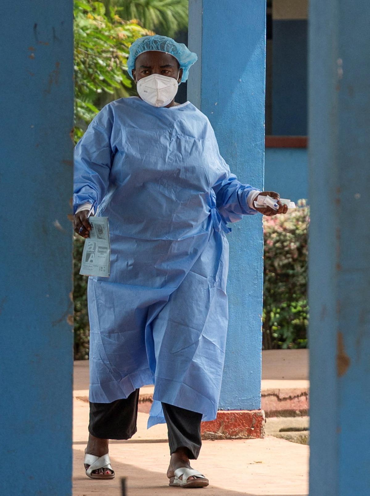 A healthcare worker at the Bunia General Referral Hospital following a resurgence of Ebola involving the Bundibugyo strain, a rarer variant of the virus with no approved vaccine currently available, in Bunia, Ituri province of the Democratic Republic of Congo May 21, 2026. REUTERS/Stringer