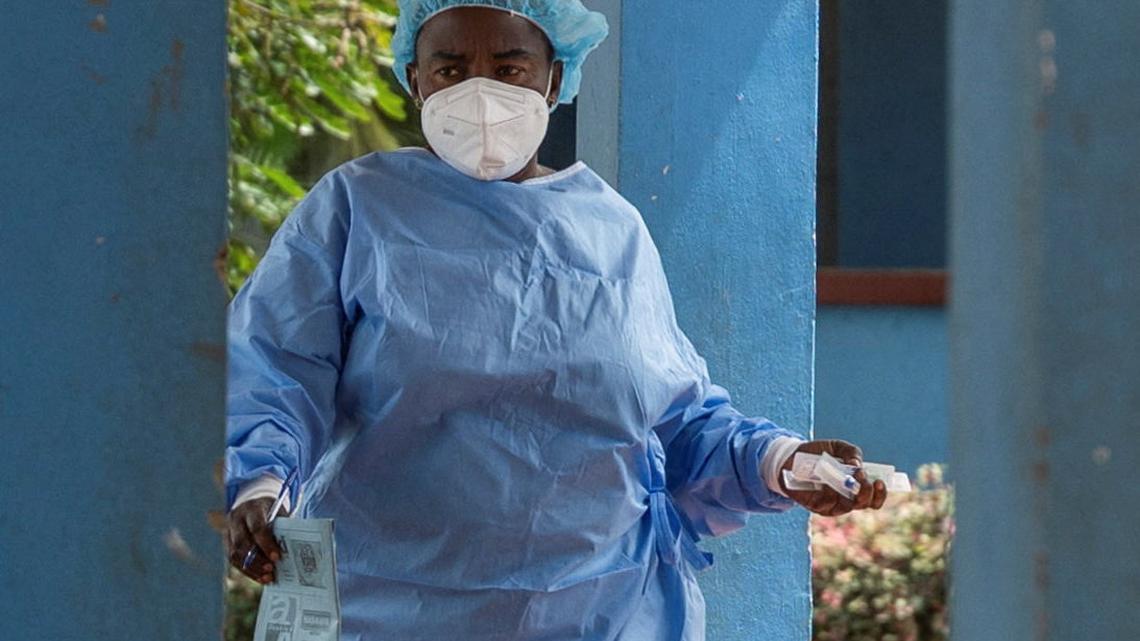 Volunteers go door-to-door in Congo to tackle Ebola rumors, aid network says 