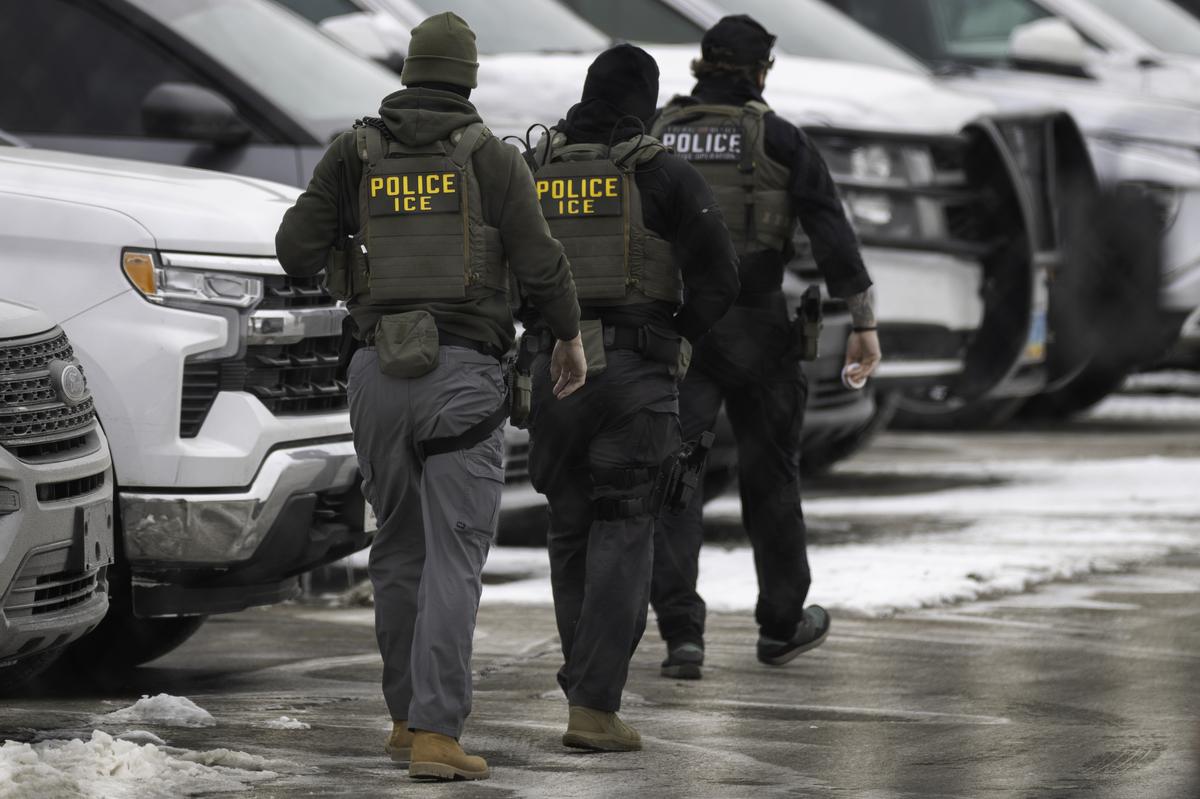  ICE agents depart the Bishop Henry Whipple Federal Building on February 4, 2026, in Minneapolis. 