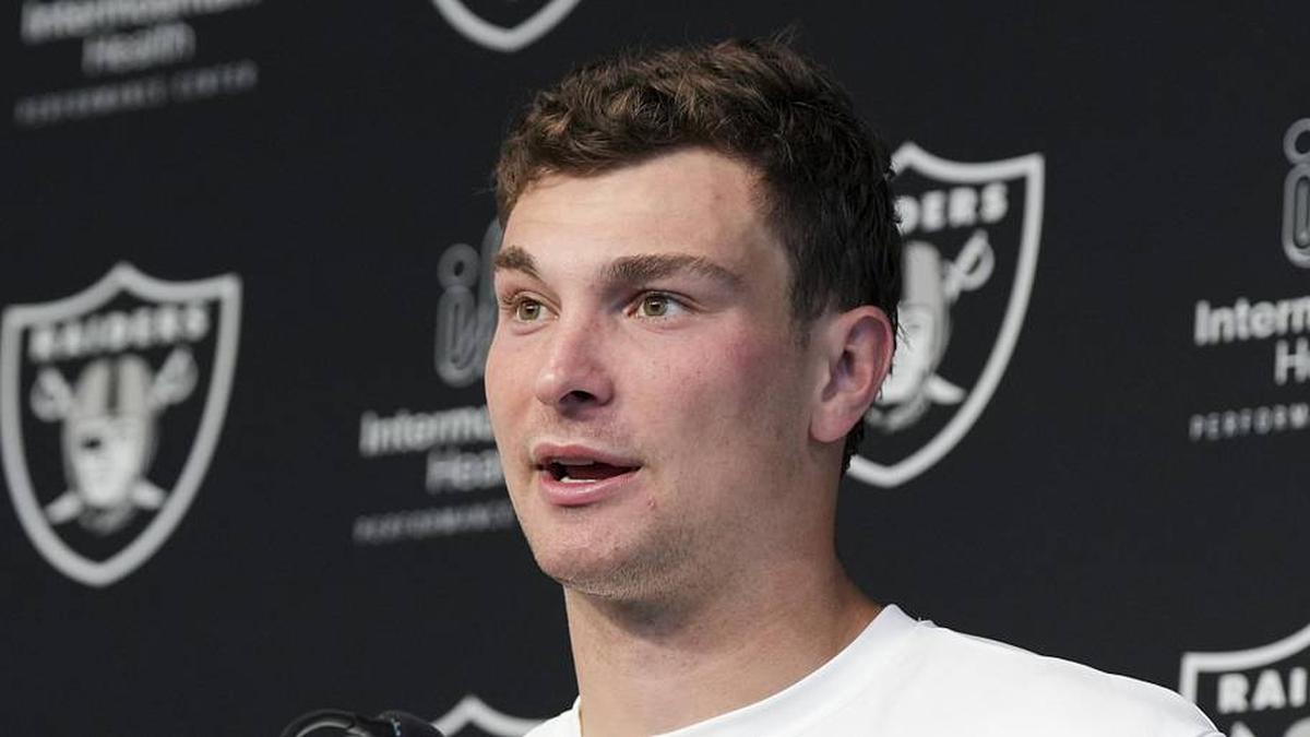  May 2, 2026; Henderson, NV, USA; Las Vegas Raiders quarterback Fernando Mendoza (15) speaks during a news conference at the team's Rookie Minicamp at Intermountain Health Performance Center. Mandatory Credit: Candice Ward-Imagn Images | Candice Ward-Imagn Images 