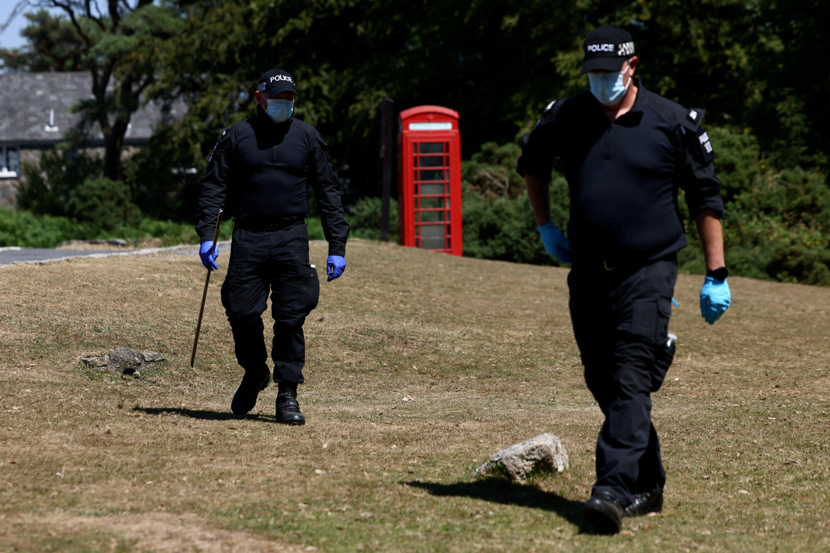FILE PHOTO: Police officers investigate the area near the home of 78-year-old former government minister Ann Widdecombe after she was found dead, in Haytor, Britain, July 11, 2026. REUTERS/Jack Taylor/File Photo