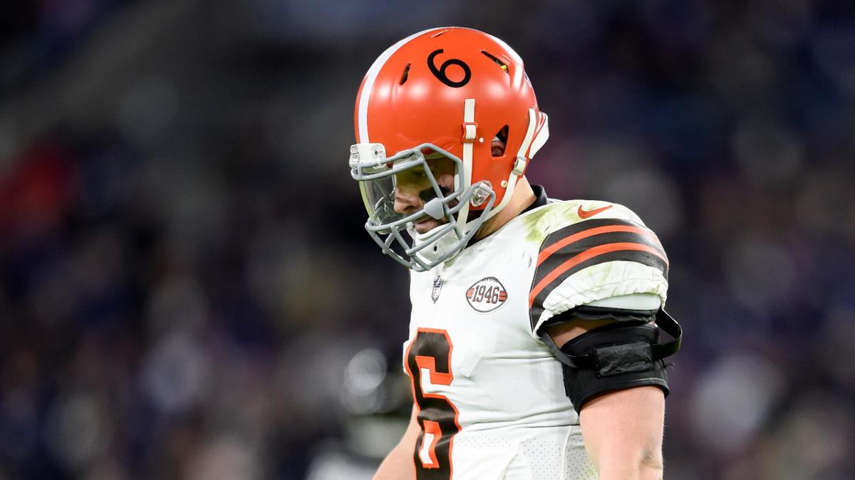 Cleveland Browns quarterback Baker Mayfield (6) and cornerback A.J. Green (38) head to the bench after a series against the Baltimore Ravens during the second half of an NFL football game, Sunday, Nov. 28, 2021, in Baltimore. (AP Photo/Gail Burton)