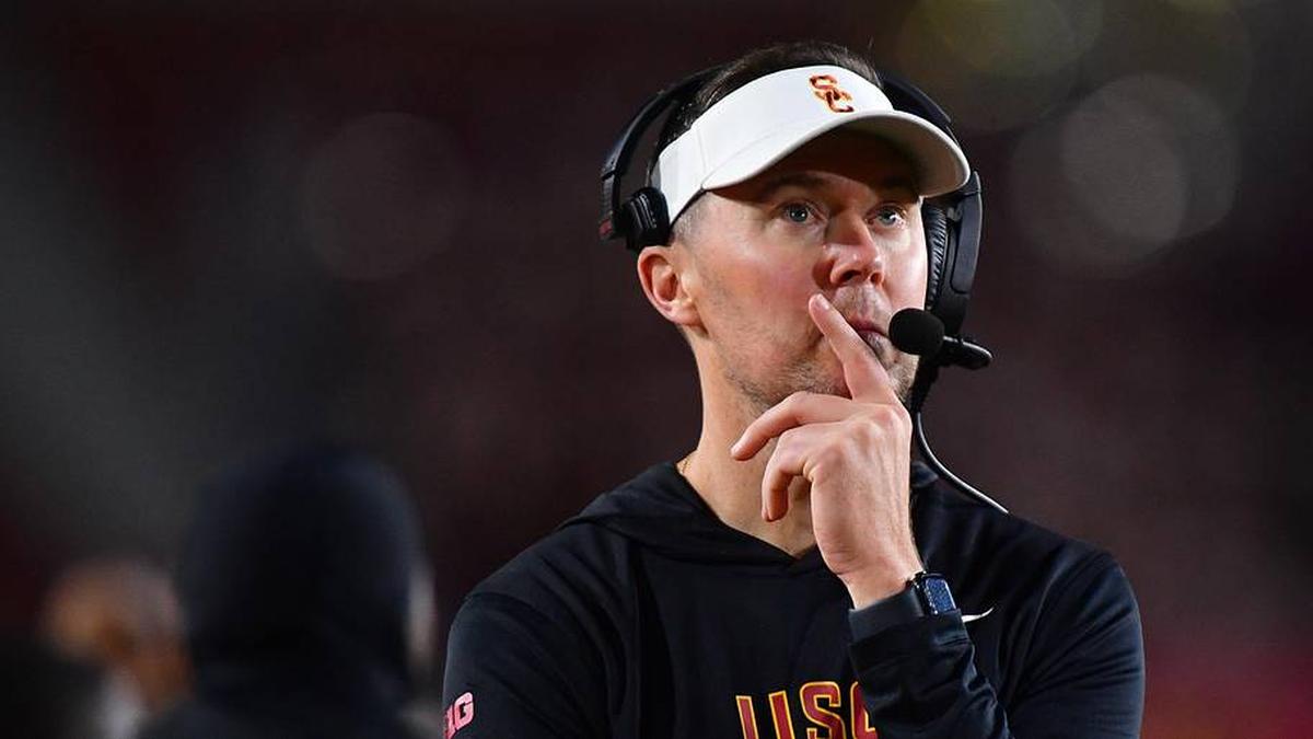  Nov 7, 2025; Los Angeles, California, USA; Southern California Trojans head coach Lincoln Riley watches game action against the Northwestern Wildcats during the second half at the Los Angeles Memorial Coliseum. Mandatory Credit: Gary A. Vasquez-Imagn Images | Gary A. Vasquez-Imagn Images 