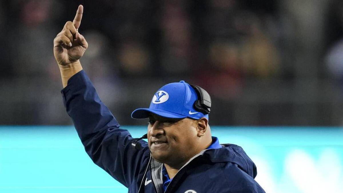  Nov 22, 2025; Cincinnati, Ohio, USA; BYU Cougars head coach Kalani Sitake works the sideline against the Cincinnati Bearcats in the second half at Nippert Stadium. Mandatory Credit: Aaron Doster-Imagn Images | Aaron Doster-Imagn Images 