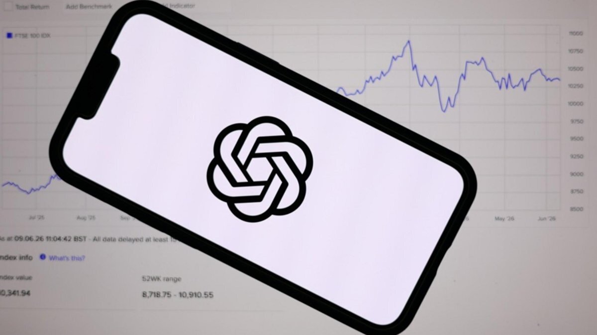 The ChatGPT logo is displayed on a mobile phone over a stock market graph displayed on a laptop screen in Liverpool, Britain, 09 June 2026. Photo by ADAM VAUGHAN / EPA