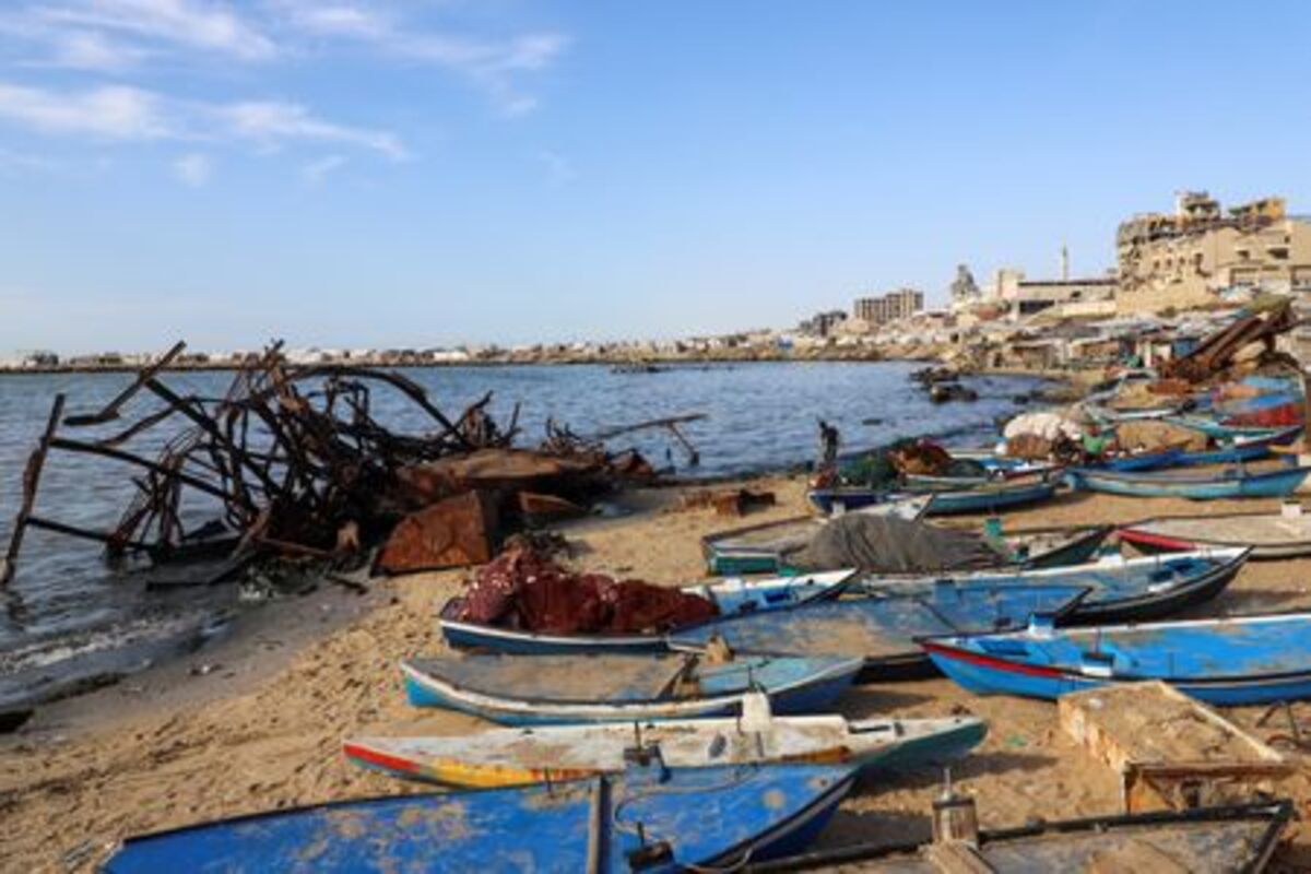 Skiffs used by Palestinian fishermen are docked on the beach in Gaza City, June 3, 2026. REUTERS/Ebrahim Hajjaj