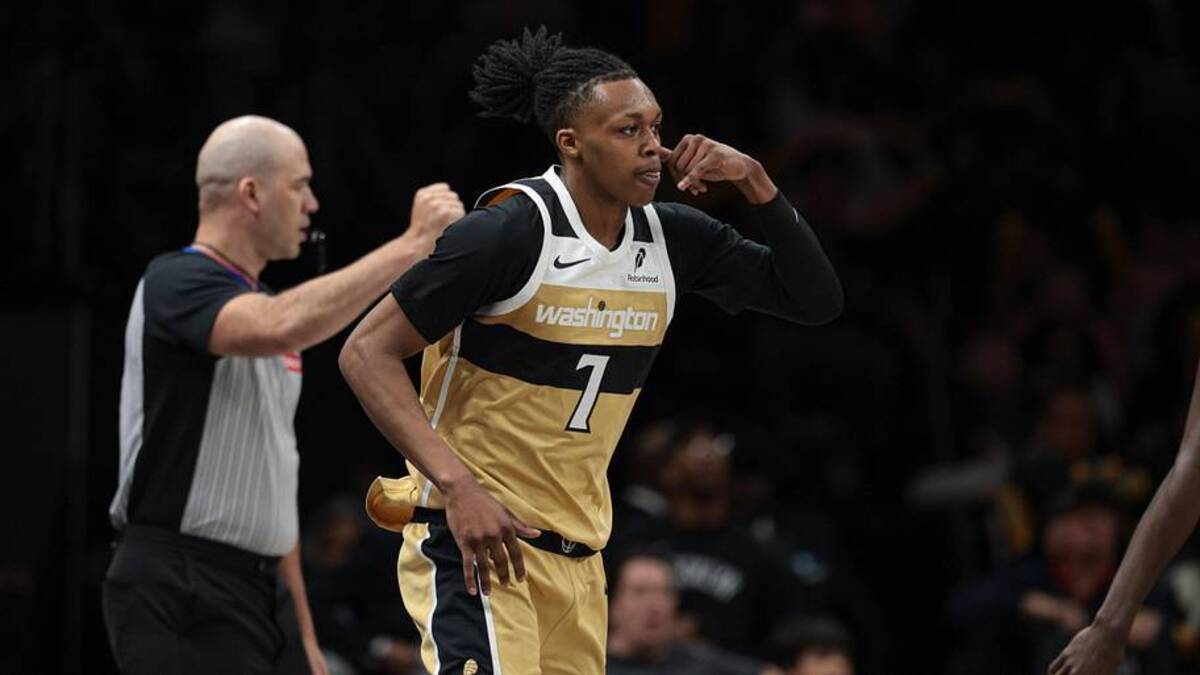  Apr 5, 2026; Brooklyn, New York, USA; Washington Wizards guard Bub Carrington (7) reacts after making a three-point basket during the second half against the Brooklyn Nets at Barclays Center. | Vincent Carchietta-Imagn Images 