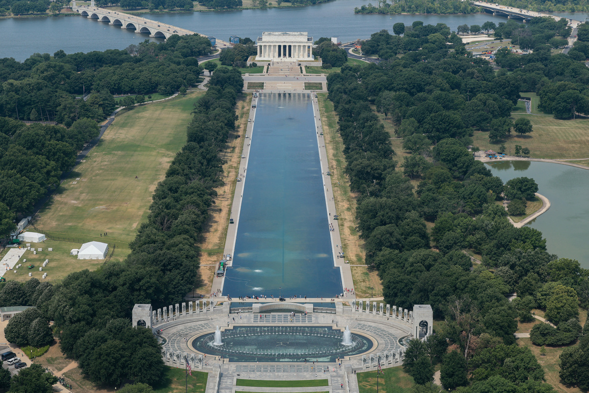 Cleanup continues on the Lincoln Memorial Reflecting Pool, after recent renovations following a directive from U.S. President Donald Trump to paint it blue ahead of the 250th anniversary of U.S. independence,, in Washington, D.C., U.S., June 22, 2026. REUTERS/Kylie Cooper