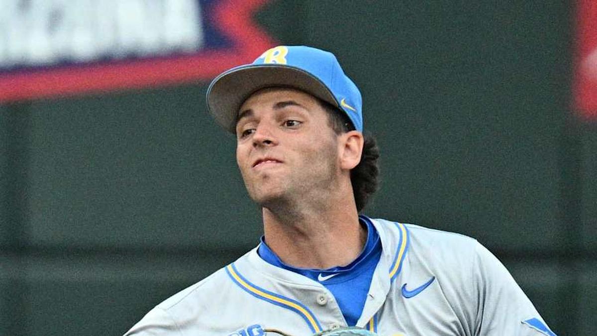  Jun 17, 2025; Omaha, Neb, USA; UCLA Bruins shortstop Roch Cholowsky (1) completes a double play after getting Arkansas Razorbacks center fielder Justin Thomas Jr. (4) out during the fifth inning at Charles Schwab Field. Mandatory Credit: Steven Branscombe-Imagn Images | Steven Branscombe-Imagn Images 