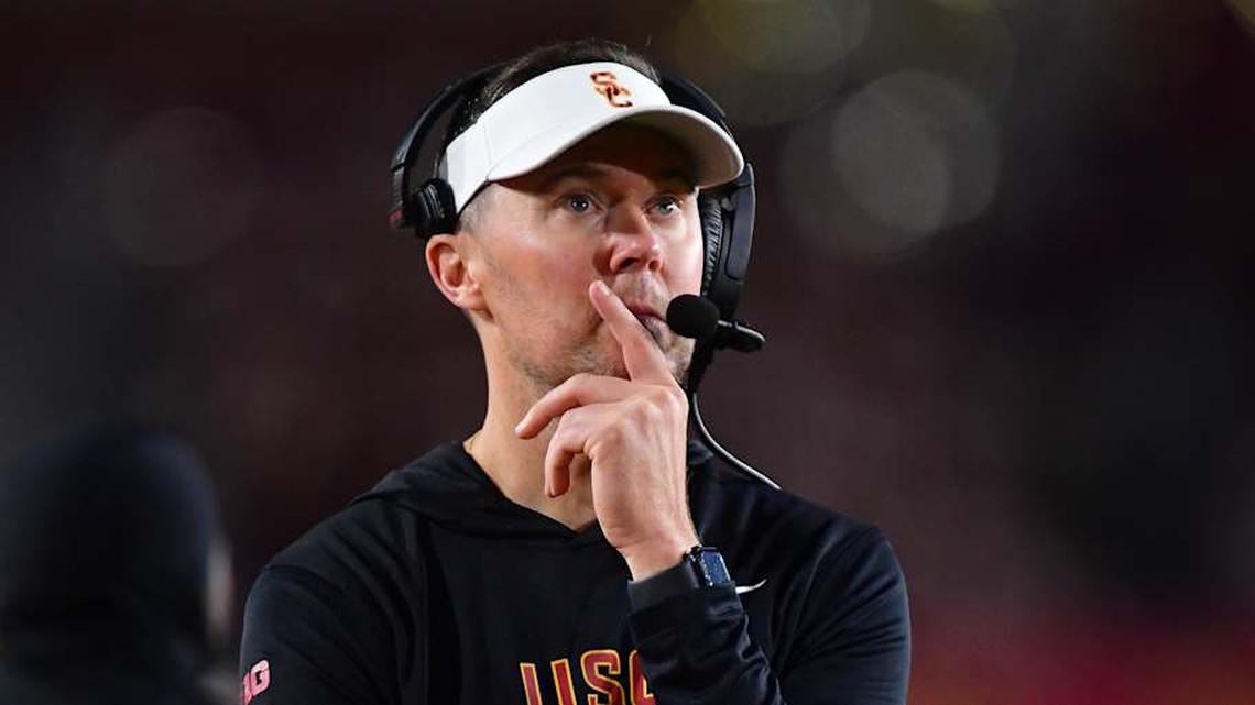  Nov 7, 2025; Los Angeles, California, USA; Southern California Trojans head coach Lincoln Riley watches game action against the Northwestern Wildcats during the second half at the Los Angeles Memorial Coliseum. Mandatory Credit: Gary A. Vasquez-Imagn Images | Gary A. Vasquez-Imagn Images 
