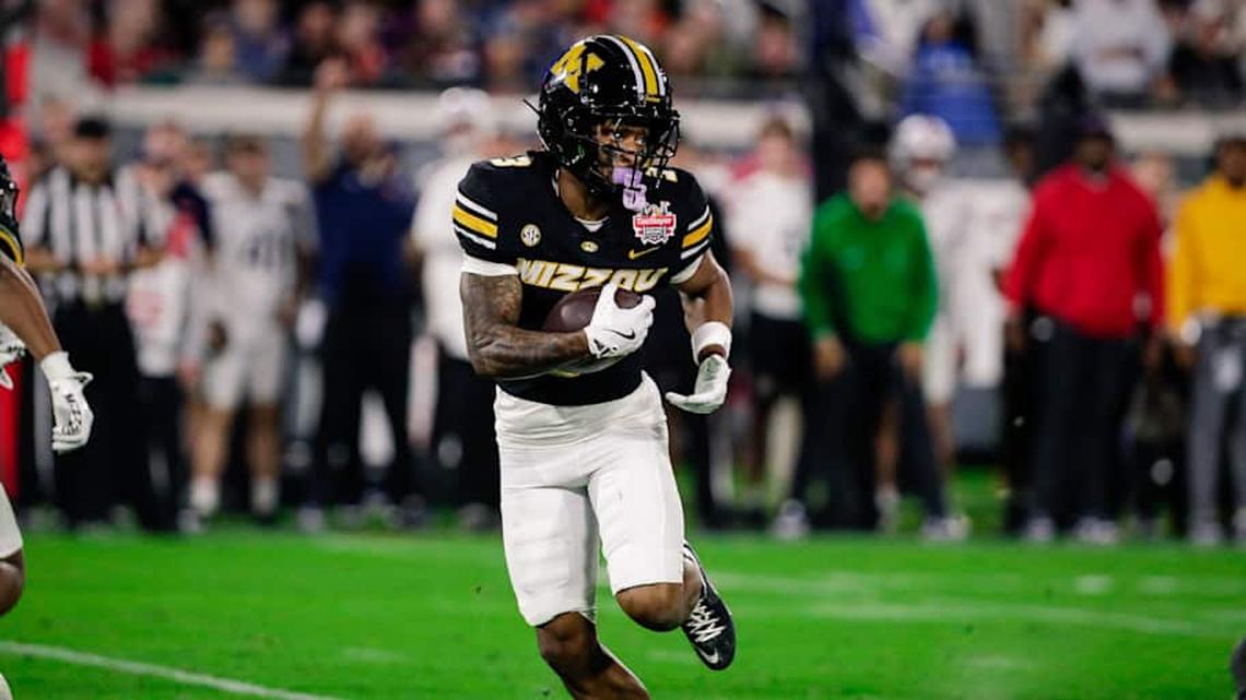  Dec 27, 2025; Jacksonville, FL, USA; Missouri Tigers wide receiver Kevin Coleman Jr. (3) runs the ball against the Virginia Cavaliers during the third quarter at EverBank Stadium. Mandatory Credit: Travis Register-Imagn Images | Travis Register-Imagn Images 