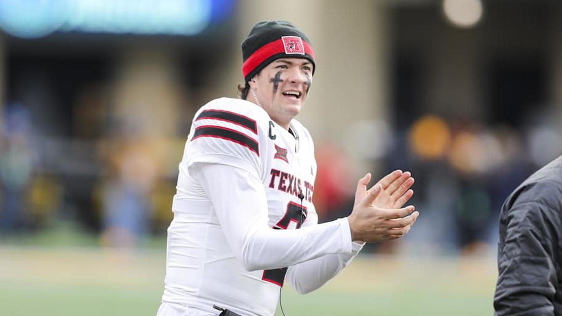  Nov 29, 2025; Morgantown, West Virginia, USA; Texas Tech Red Raiders quarterback Behren Morton (2) celebrates after a touchdown during the third quarter against the West Virginia Mountaineers at Milan Puskar Stadium. Mandatory Credit: Ben Queen-Imagn Images | Ben Queen-Imagn Images 