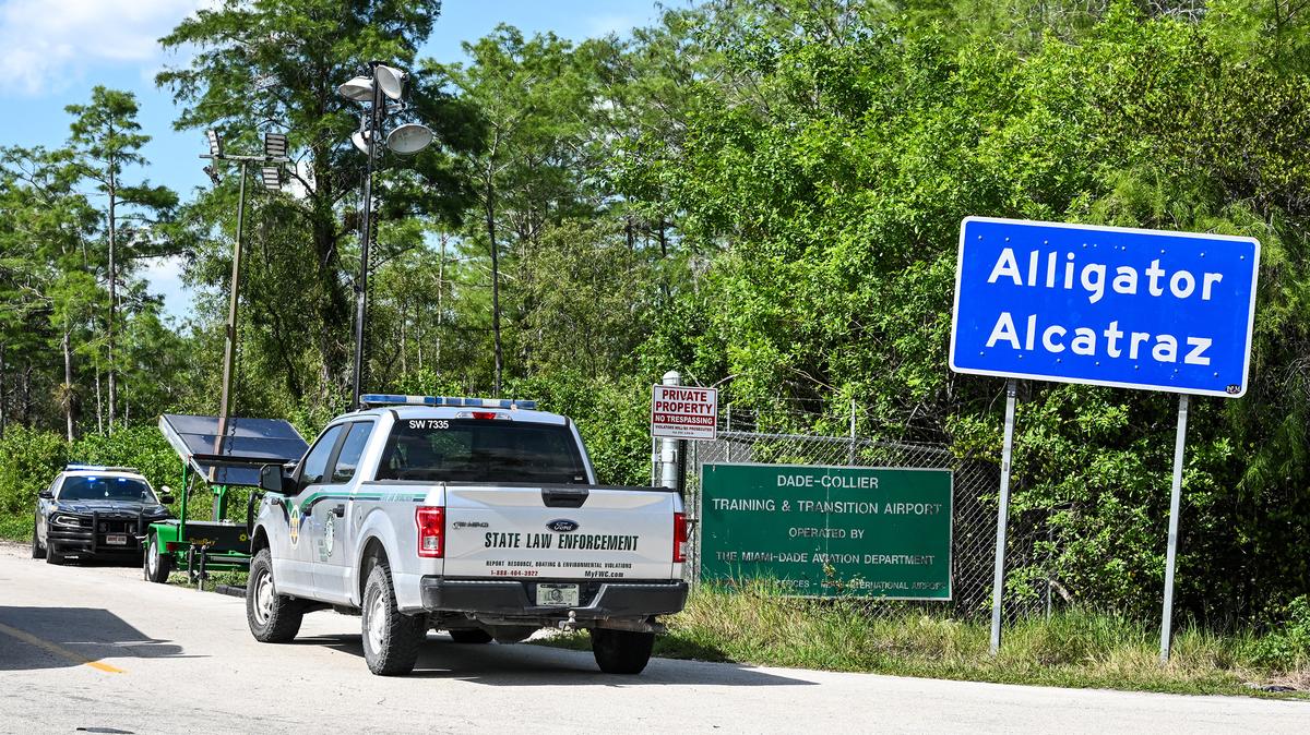 A Florida State Law Enforcement vehicle is seen driving into the immigrant detention center known as "Alligator Alcatraz" at the Dade-Collier Training and Transition Airport in Ochopee, Florida, on May 8, 2026. (Chandan Khanna/AFP via Getty Images/TNS)