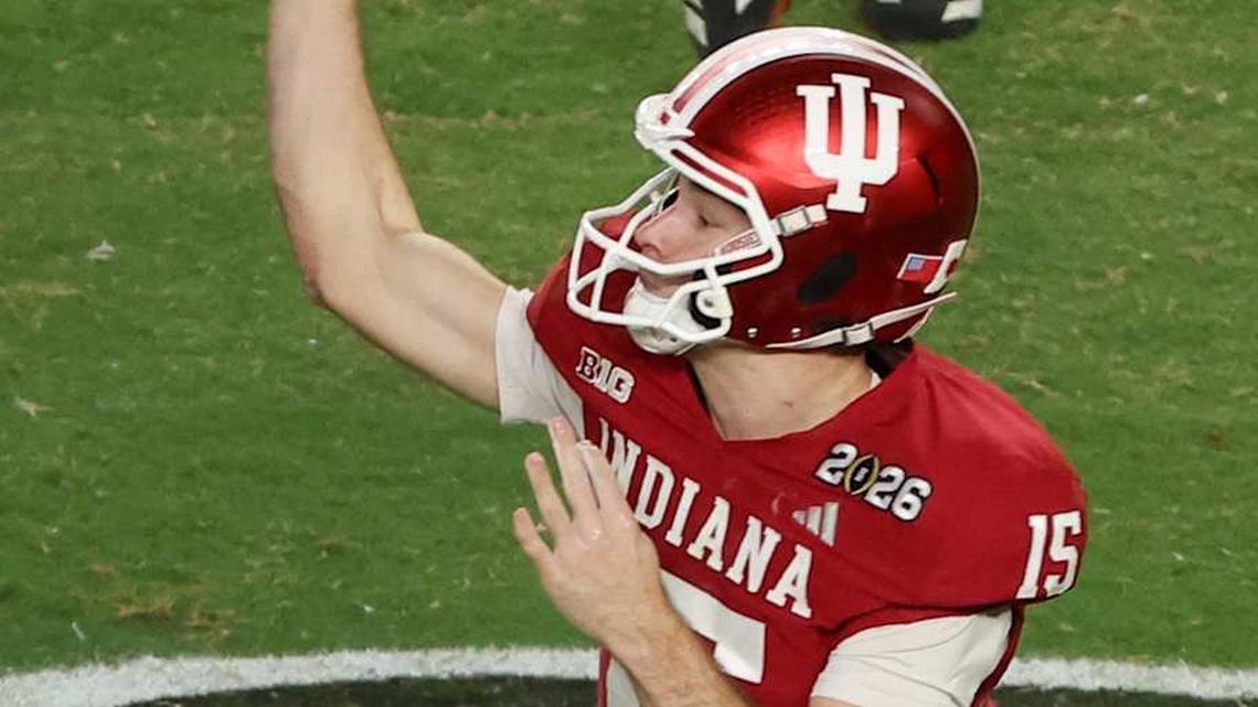  Jan 19, 2026; Miami Gardens, FL, USA; Indiana Hoosiers quarterback Fernando Mendoza (15) passes the ball against the Miami Hurricanes in the third quarter during the College Football Playoff National Championship game at Hard Rock Stadium. Mandatory Credit: Kim Klement Neitzel-Imagn Images | Kim Klement Neitzel-Imagn Images 