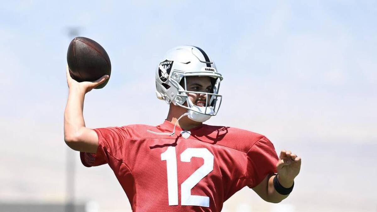  Jun 11, 2025; Henderson, NV, USA; Las Vegas Raiders quarterback Aidan O'Connell (12) throws the ball during Las Vegas Raiders Minicamp at Intermountain Health Performance Center. Mandatory Credit: Candice Ward-Imagn Images | Candice Ward-Imagn Images 