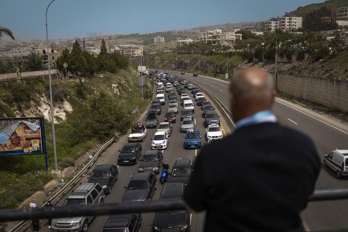 A Lebanese family returning south on the Beirut to Sidon coastal highway, on the second day of the ceasefire, Saturday, April 18, 2026. Prime Minister Benjamin Netanyahu said Israeli troops would remain inside Lebanon, as part of what he called an "expanded security zone" from Lebanon's Mediterranean coast to its border with Syria, south of the Litani River. (Diego Ibarra Sánchez/The New York Times)