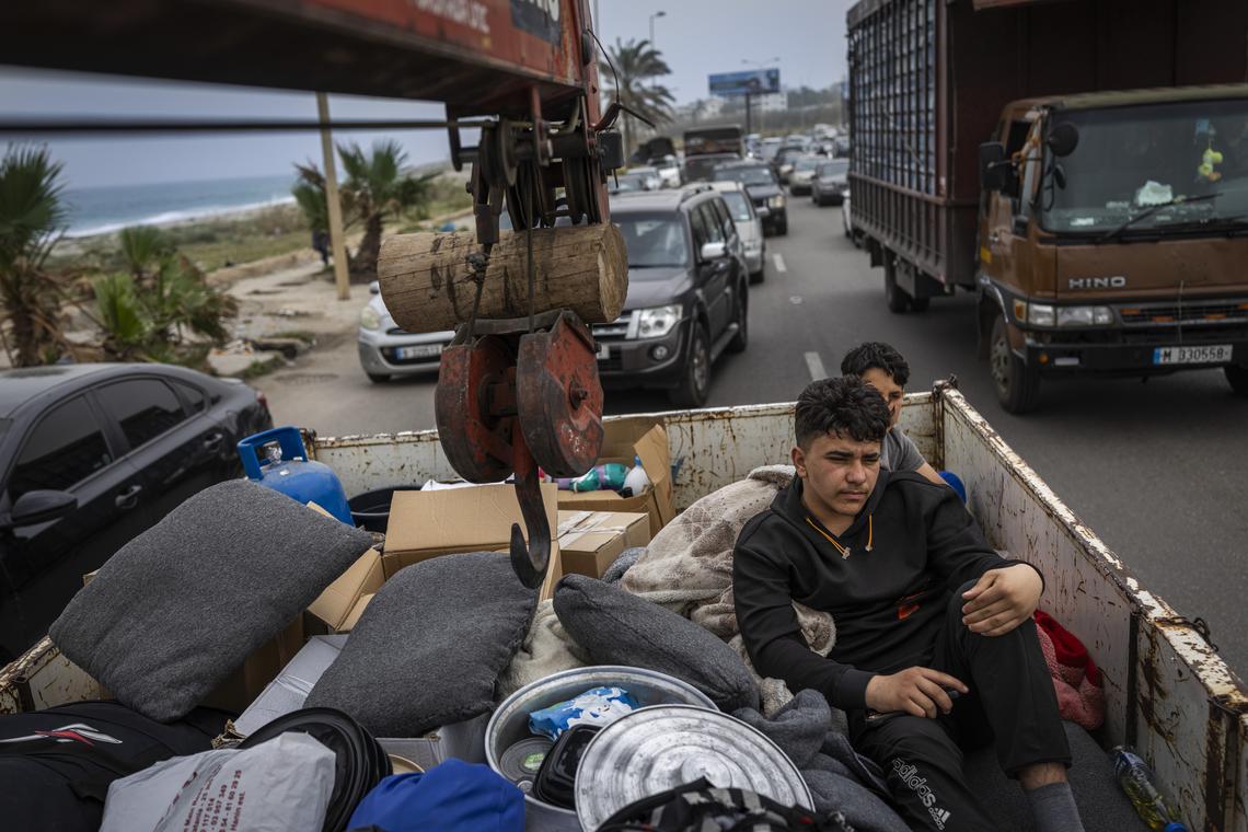 Lebanese families returning south on the Beirut to Sidon coastal highway, on the second day of the ceasefire, Saturday, April 18, 2026. Prime Minister Benjamin Netanyahu said Israeli troops would remain inside Lebanon, as part of what he called an "expanded security zone" from Lebanon's Mediterranean coast to its border with Syria, south of the Litani River. (Diego Ibarra Sánchez/The New York Times)