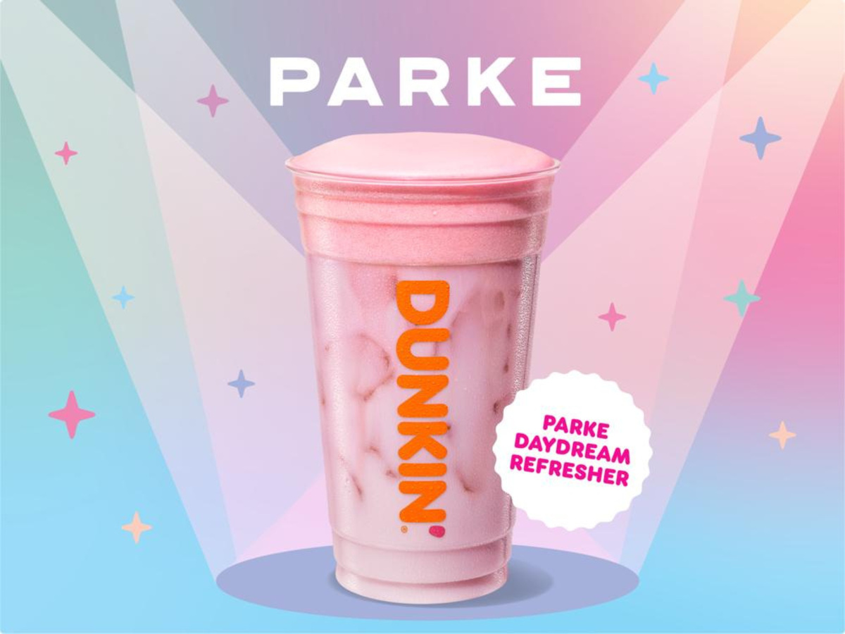 The Parke Daydream Refresher is a pink summer beverage that blends strawberry dragon fruit and a strawberry flavor shot with creamy oat milk, and which is topped with a layer of pink strawberry cold foam. Courtesy Dunkin'