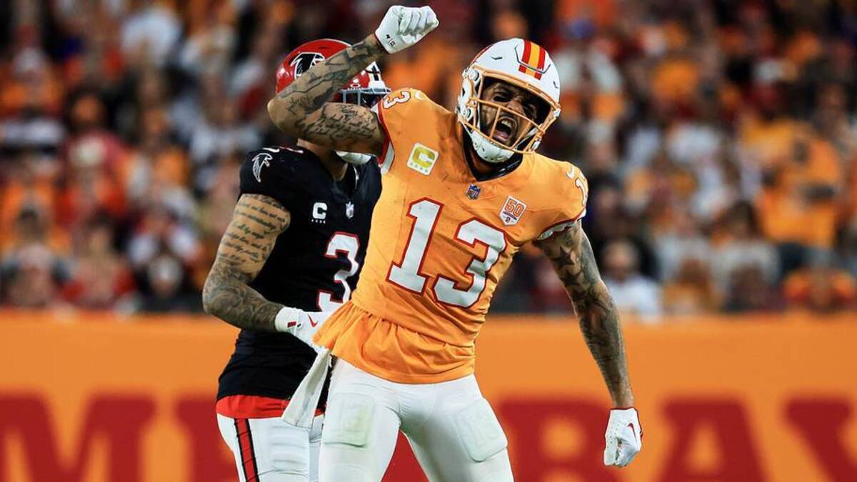  Dec 11, 2025; Tampa, Florida, USA; Tampa Bay Buccaneers wide receiver Mike Evans (13) reacts after catching a pass against Atlanta Falcons safety Jessie Bates III (3) (obscured) during the third quarter at Raymond James Stadium. Mandatory Credit: Kim Klement Neitzel-Imagn Images | Kim Klement Neitzel-Imagn Images 