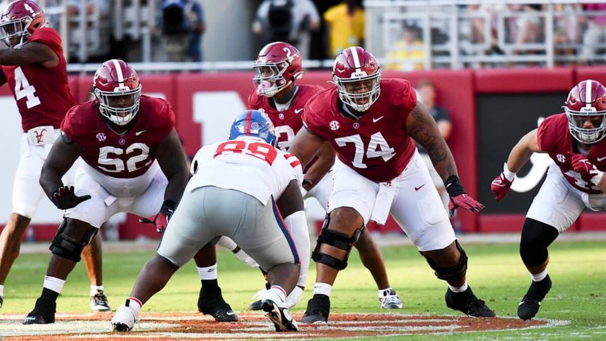 Sep 23, 2023; Tuscaloosa, Alabama, USA; Alabama Crimson Tide offensive lineman Tyler Booker (52) and Alabama Crimson Tide offensive lineman Kadyn Proctor (74) block against Mississippi at Bryant-Denny Stadium. Alabama defeated Mississippi 24-10. | USA TODAY Sports via Reuters Connect 