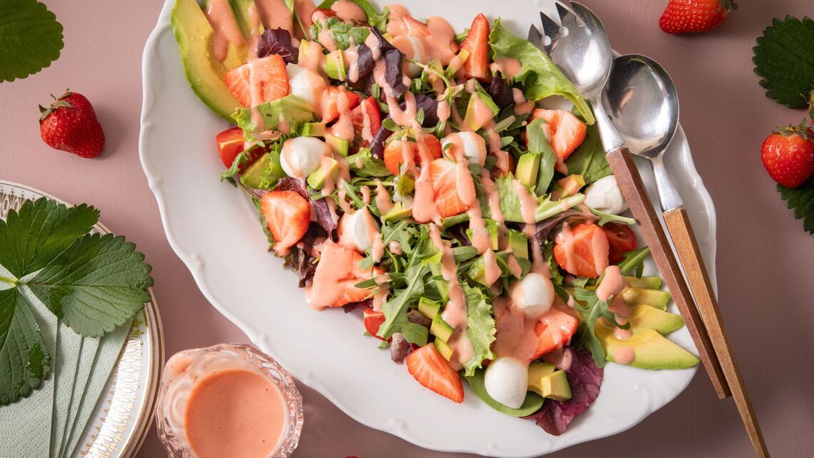 Sweet and crunchy salad with strawberry dressing - plus blue flowers 