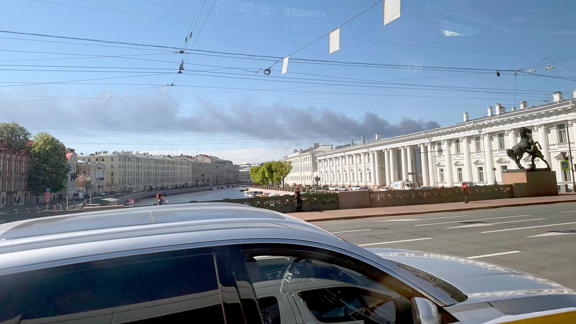 Drones hit St Petersburg port as Putin hosts major economic forum 