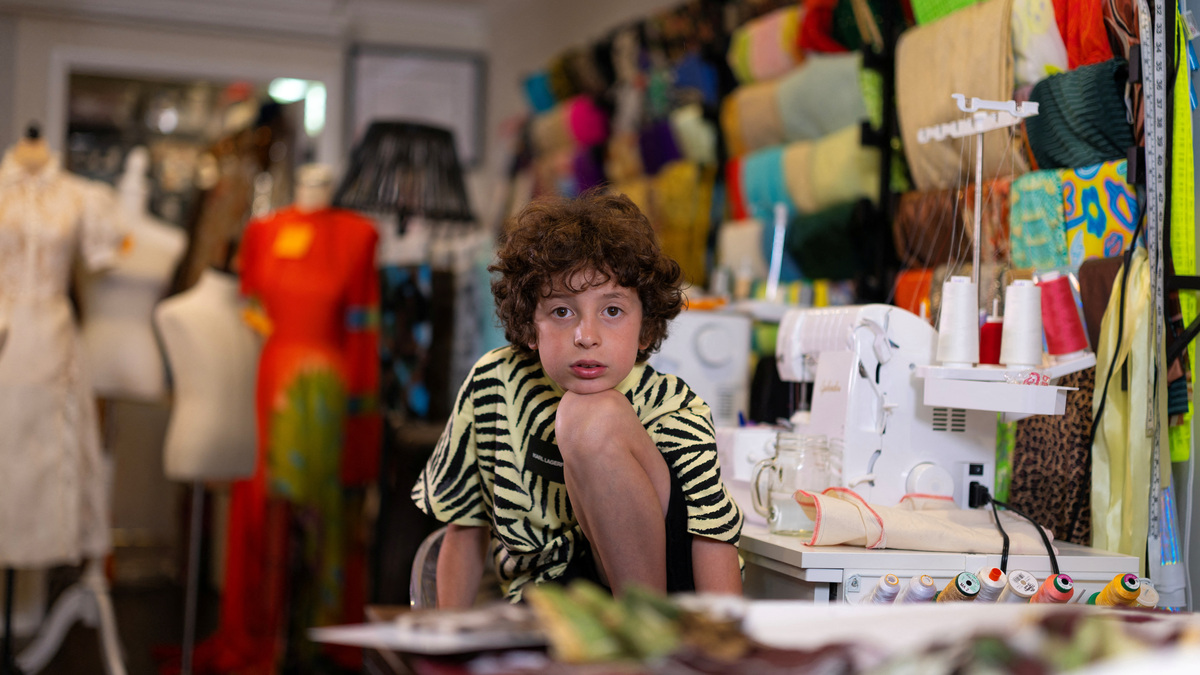 Max Alexander, 10, a fashion designer who recently debuted his first runway show in Paris, poses for a picture in his studio at his parents' home in Los Angeles, Calif.