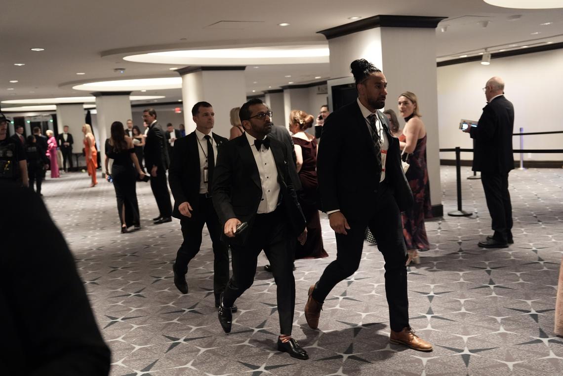FBI Director Kash Patel, center, at the Washington Hilton during the White House Correspondents' Association dinner in Washington on Saturday, April 25, 2026. President Trump was rushed out of the White House correspondents' dinner on Saturday night after reports of gunfire. (Salwan Georges/The New York Times)